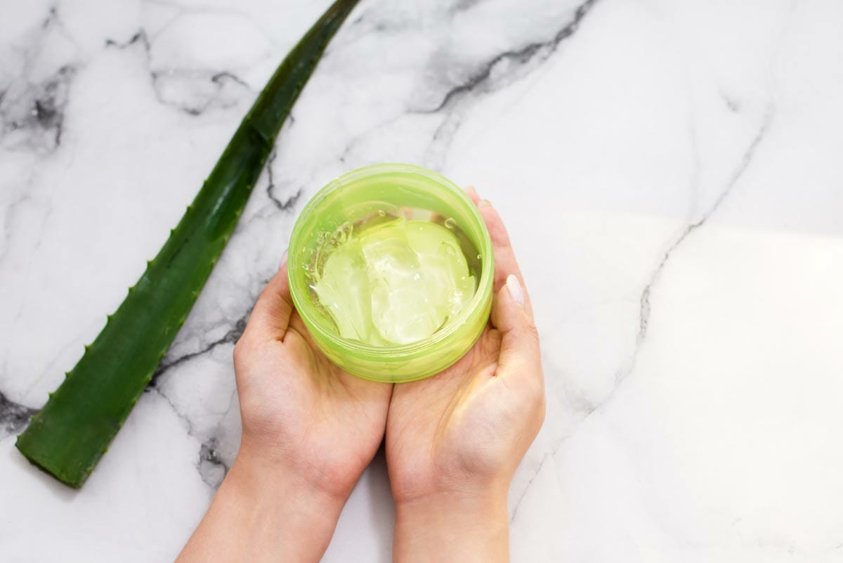 woman hands  holding homemade ale vera gel