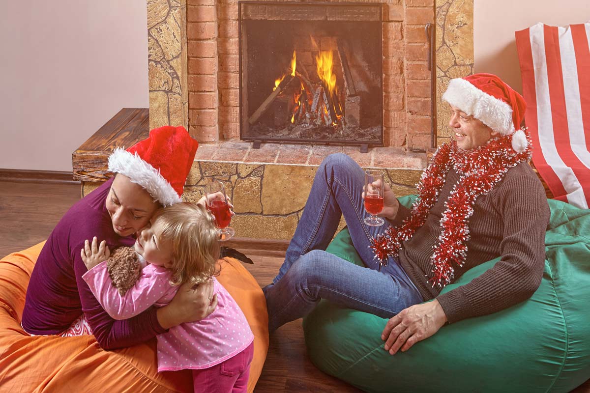 family sitting on bean bag chairs