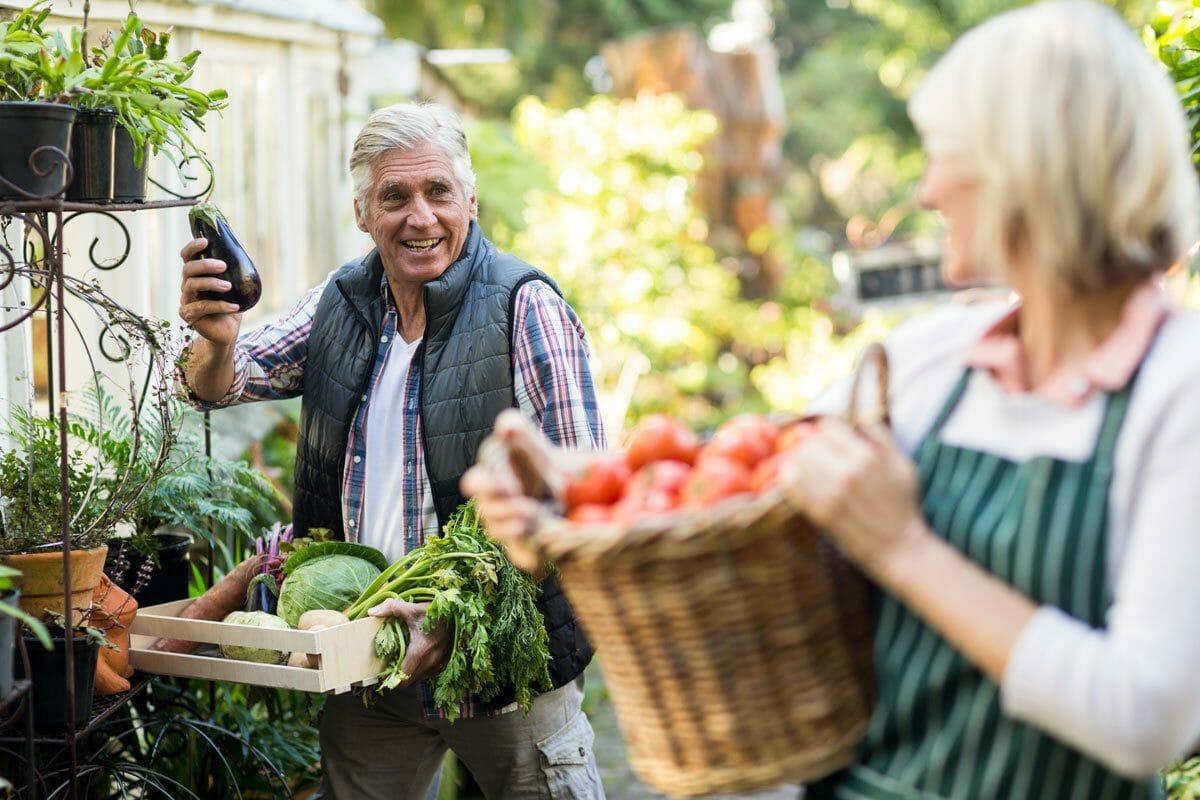 man holding an eggplant
