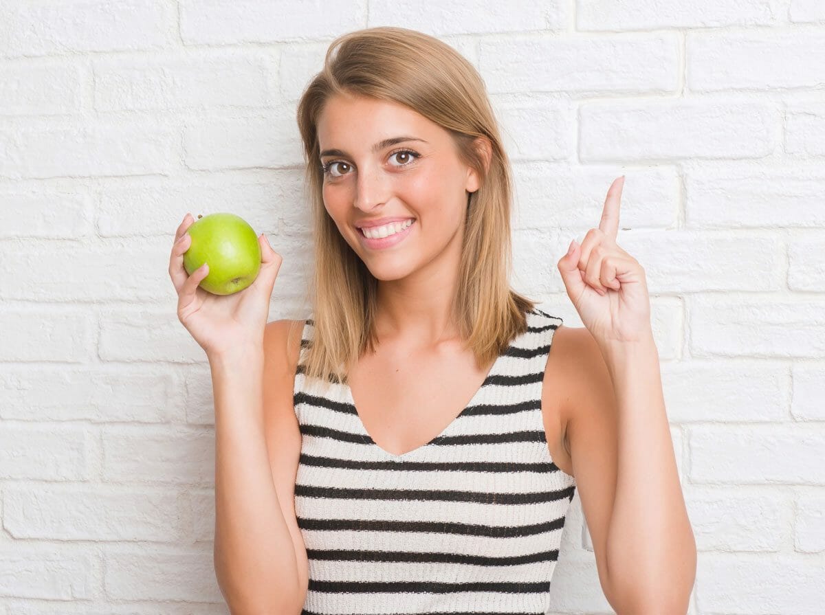 woman with apple