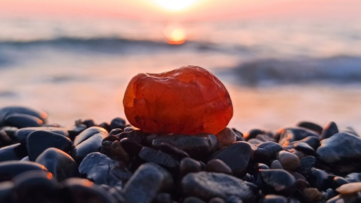 Are You a Magnet for Negativity? Use These 8 Crystals to Help Ward off Bad Vibes - carnelian stone beach ss2060458586