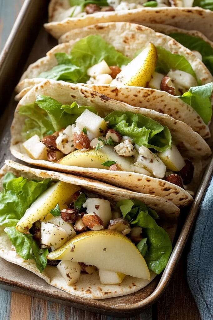Pear-fect Twist on a Classic: Waldorf Salad Meets Pita Pockets - Pear Waldorf Pitas pin