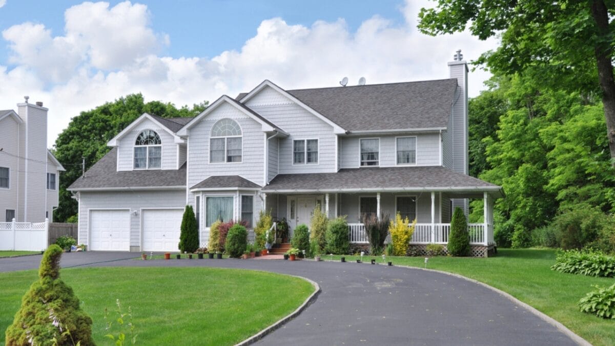 10 Types of Homes Expected to Lose Value in 2024 - large suburban mcmansion ss116052964