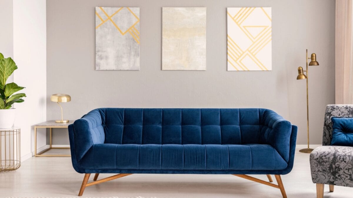 10 Paint Colors That Make Your House Look Dated & What to Use Instead - royal blue sofa dp210444264