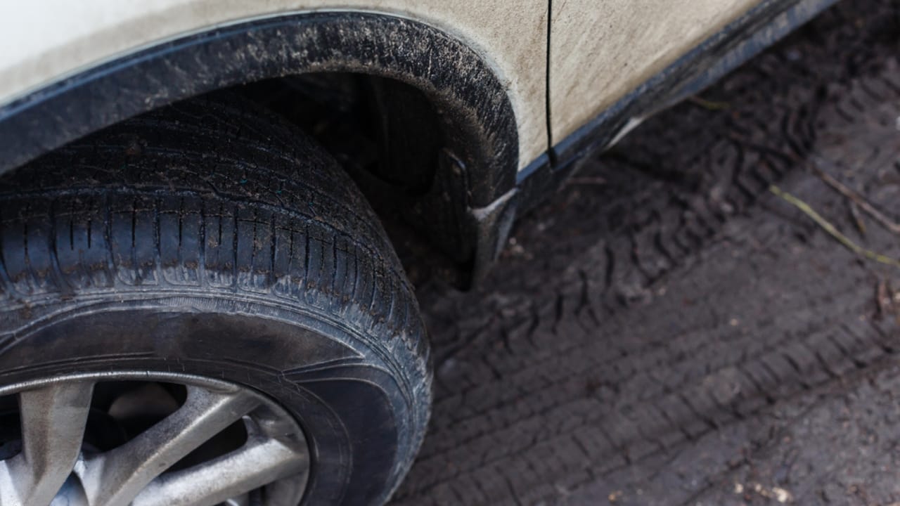 Automatic Car Washes May Be Costing You More Than You Think - Dirty wheel wells car dp506828682