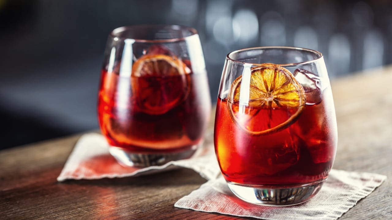 Mastering the Art of Simplicity: 20 Delicious 3-Ingredient Cocktails - Negroni cocktail dp448789044