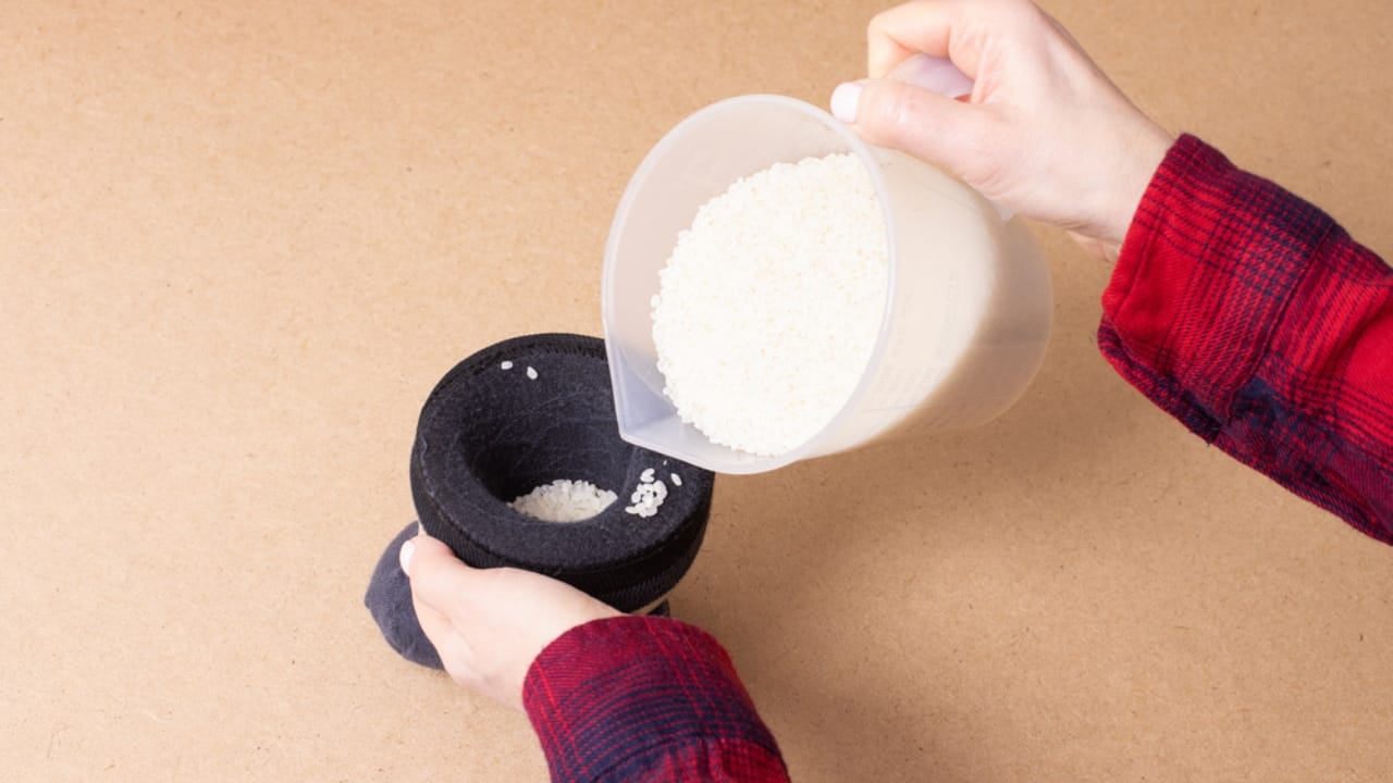 Old Socks, New Purpose: 20 Clever Ways to Reuse Them - Rice in sock ss1905118411