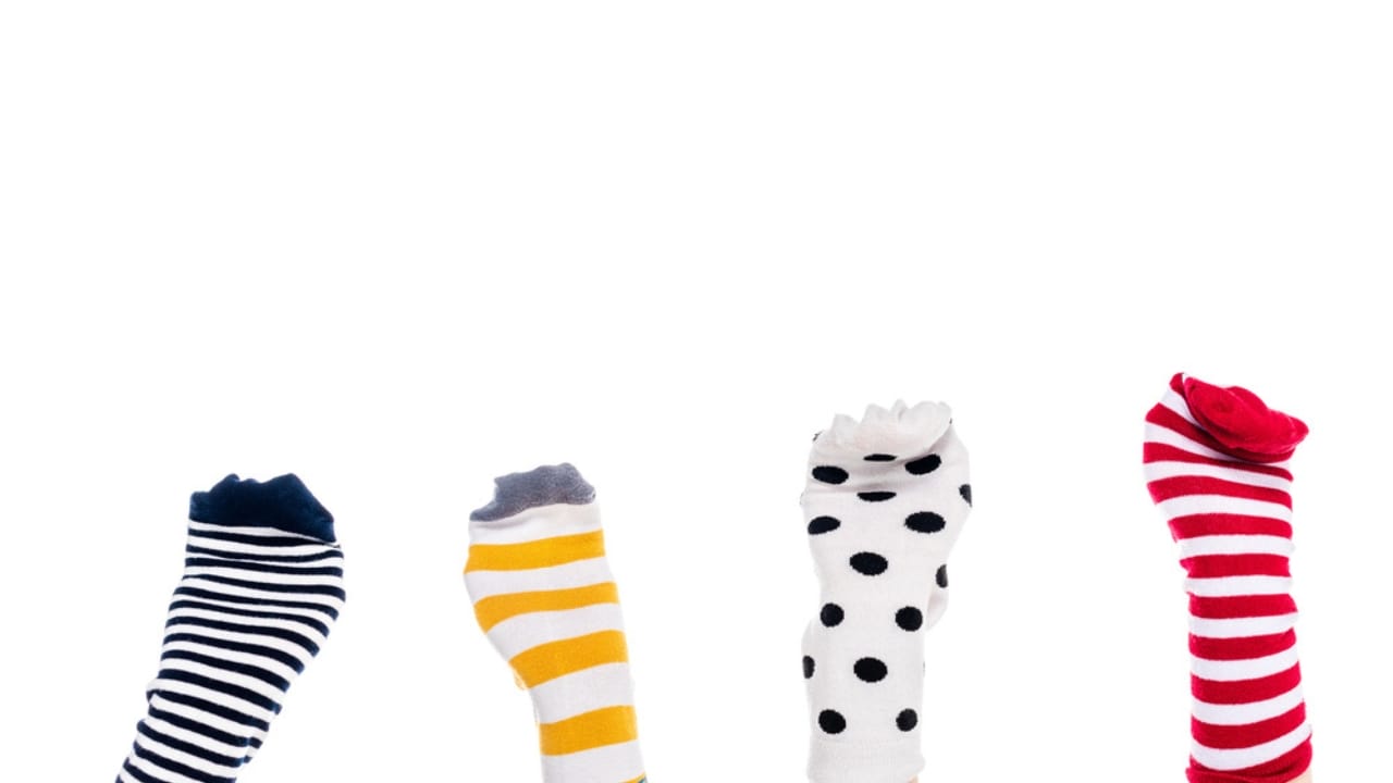Old Socks, New Purpose: 20 Clever Ways to Reuse Them - Socks on hands dp258849976