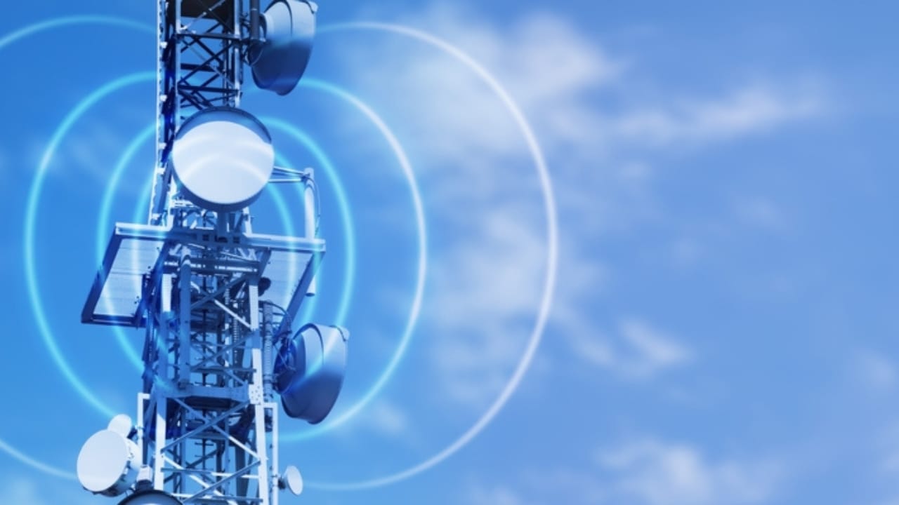 7 Off-Grid Internet Solutions for Staying Connected Anywhere - antenna tower with radio waves ss2248621789
