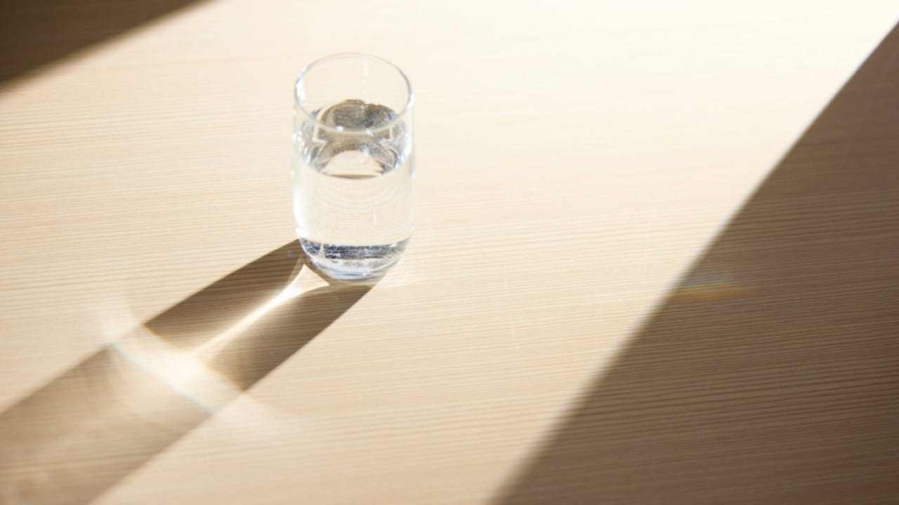 Sun Water: The Forgotten Elixir to Naturally Boost Your Health - glass of water sunlight ss2421589909