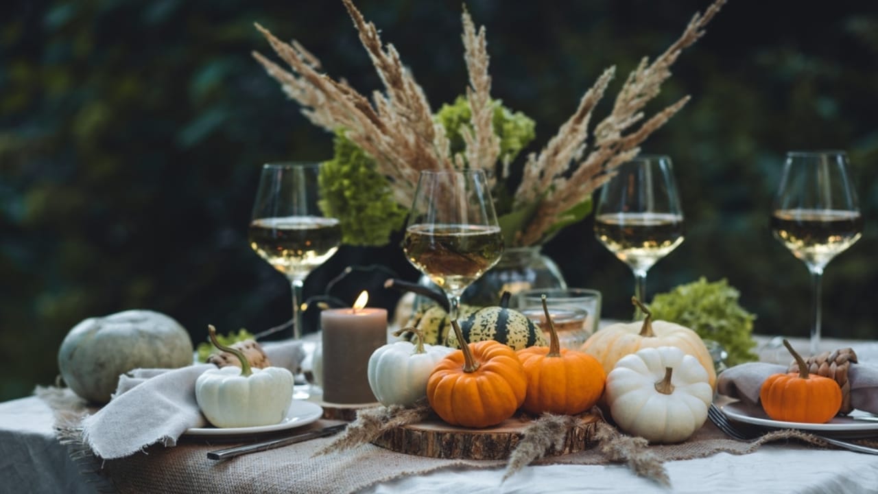 29 Fall Decor Tips for a Warm, Comfy & Inviting Home - Fall Dining Table Arrangement with pumpkin ss2370793841
