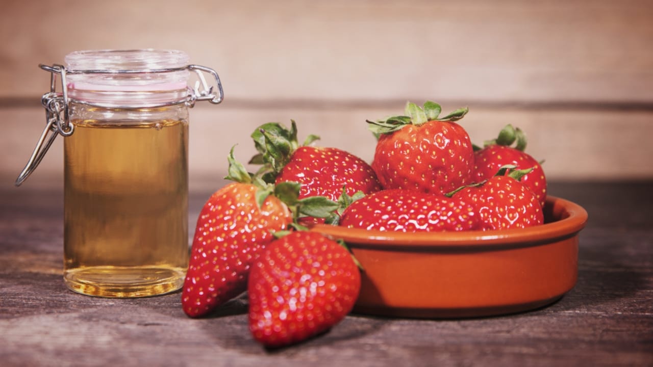 Extend Your Berries’ Shelf Life with This Simple Vinegar Trick - vinegar and strawberry ss613413317