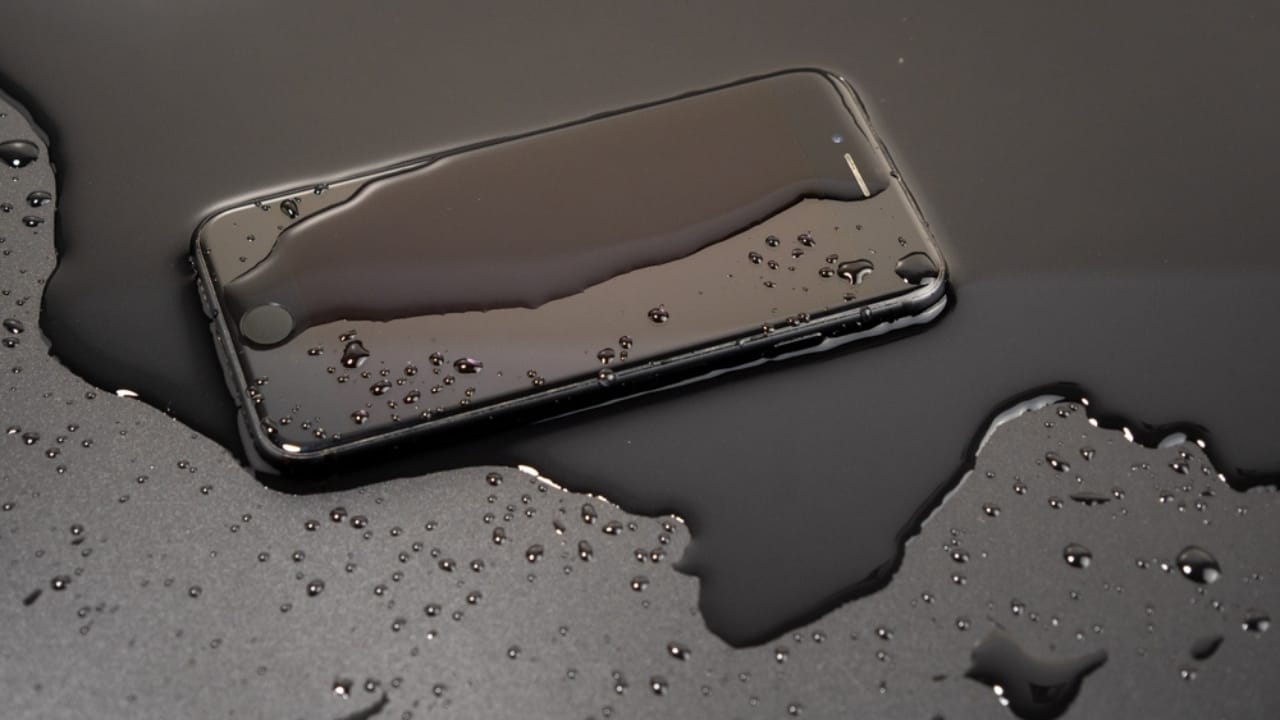 Cat Litter Isn’t Just for Cats: 10 Other Creative Alternative Uses - water spilled on smartphone ss2309953855
