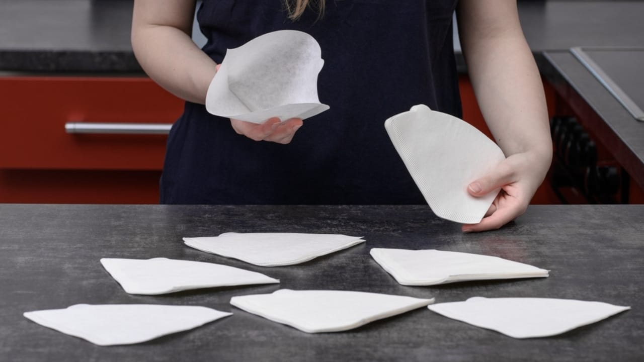 More Than Just for Coffee: 25 Life-Saving Uses for Coffee Filters - woman holding coffee filters ss2508841111