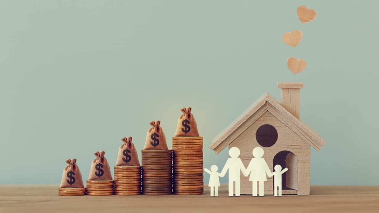 Suze Orman Shares the Top 12 Estate Planning Strategies Every American Should Know - mini house with family ss1654146454
