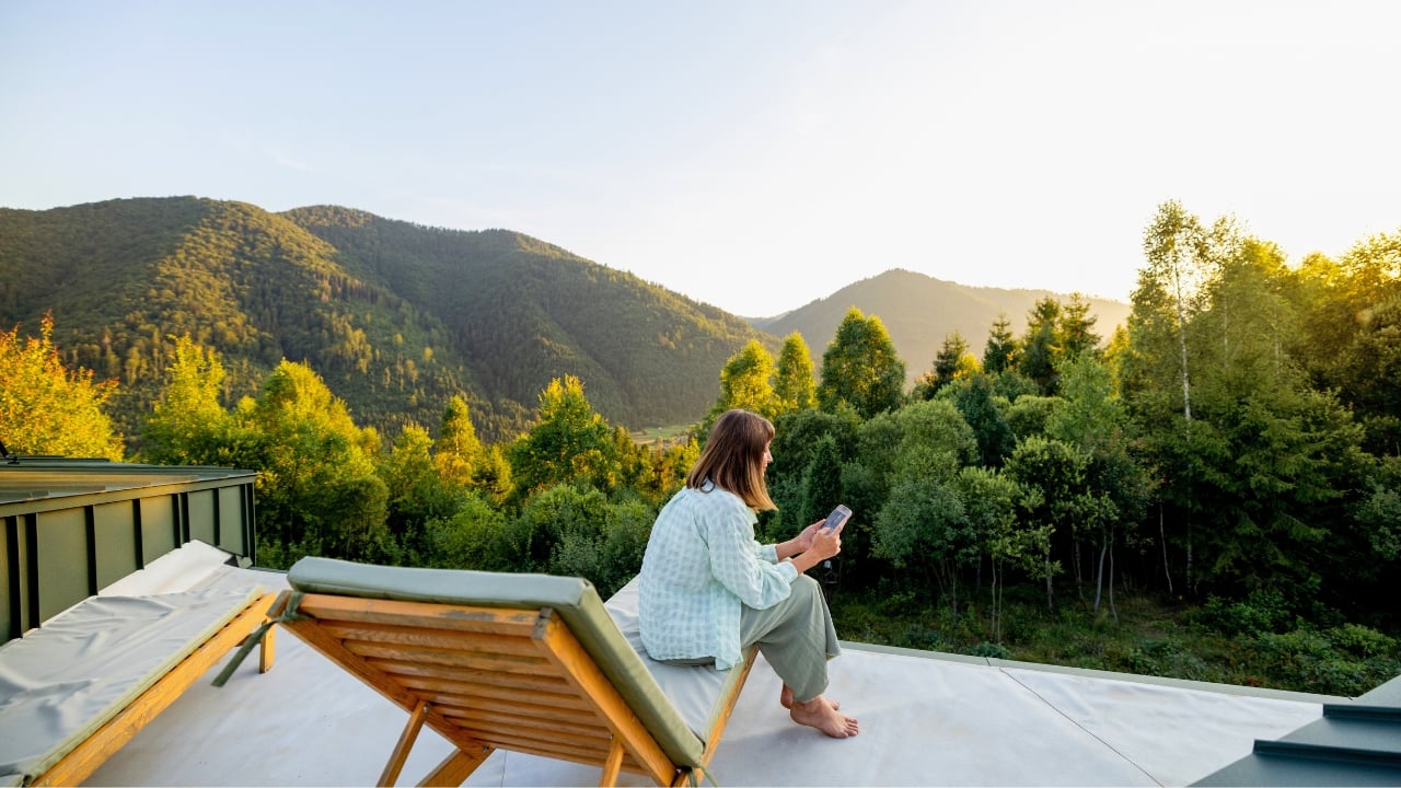 7 Off-Grid Internet Solutions for Staying Connected Anywhere - woman phone nature ss2538979529 degm
