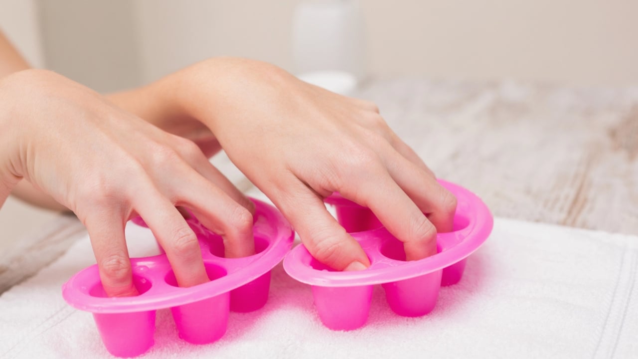 20 Everyday Hydrogen Peroxide Uses Everyone Should Know - Woman soaking nails dp81723942 dnoh