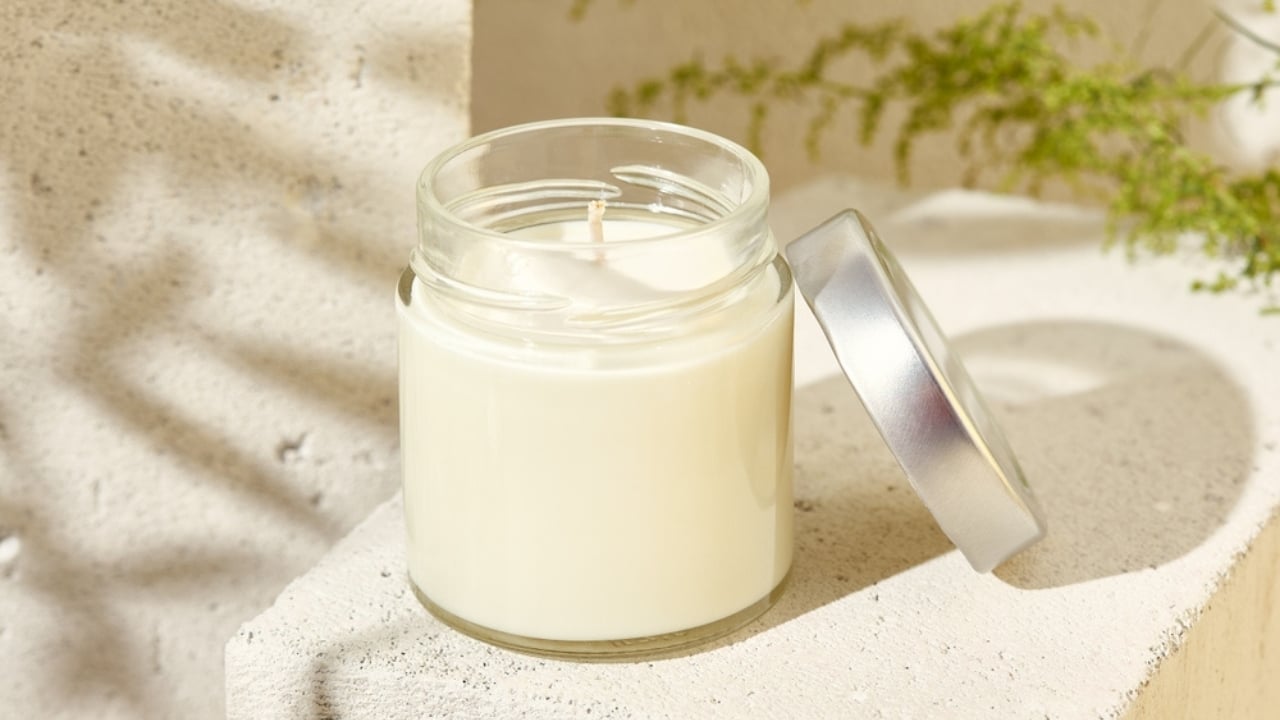 Say Goodbye to Mosquitoes with These DIY Mason Jar Candles - candle in jar ss2281057367 dpdgm