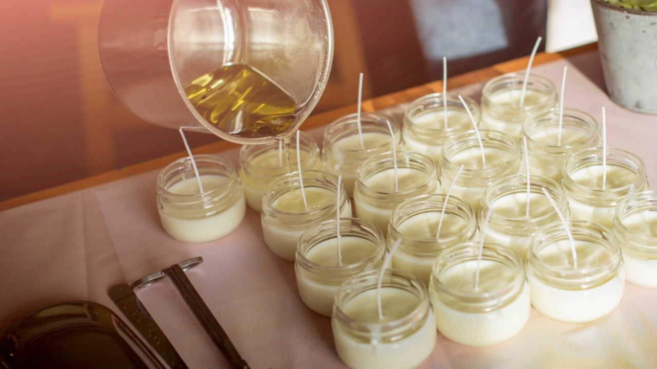 Say Goodbye to Mosquitoes with These DIY Mason Jar Candles - making candles with a jar ss1948236958 dpdgm
