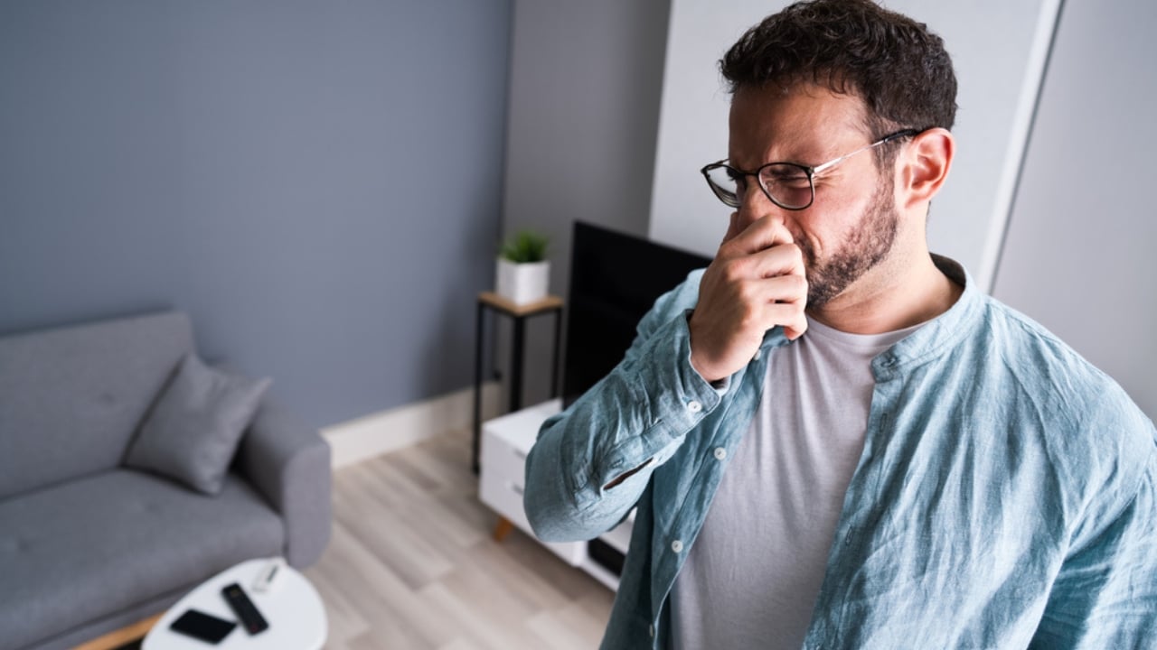 8 Easy Ways to Get Rid of That Musty "Old House" Smell - man smells bad odor house air conditioner ss1845418153 adyh