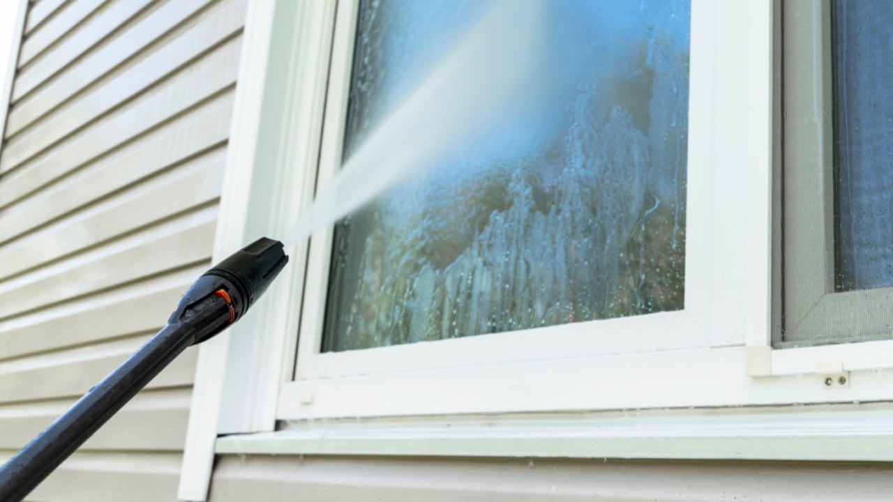 14 Items You Should Never Clean With a Pressure Washer - pressure washer window ss1443947501 adyh
