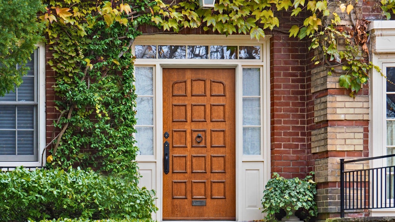 15 Unique Features Found Only in Pre-1900s Homes - Wooden front door of house ss1225611877 degm