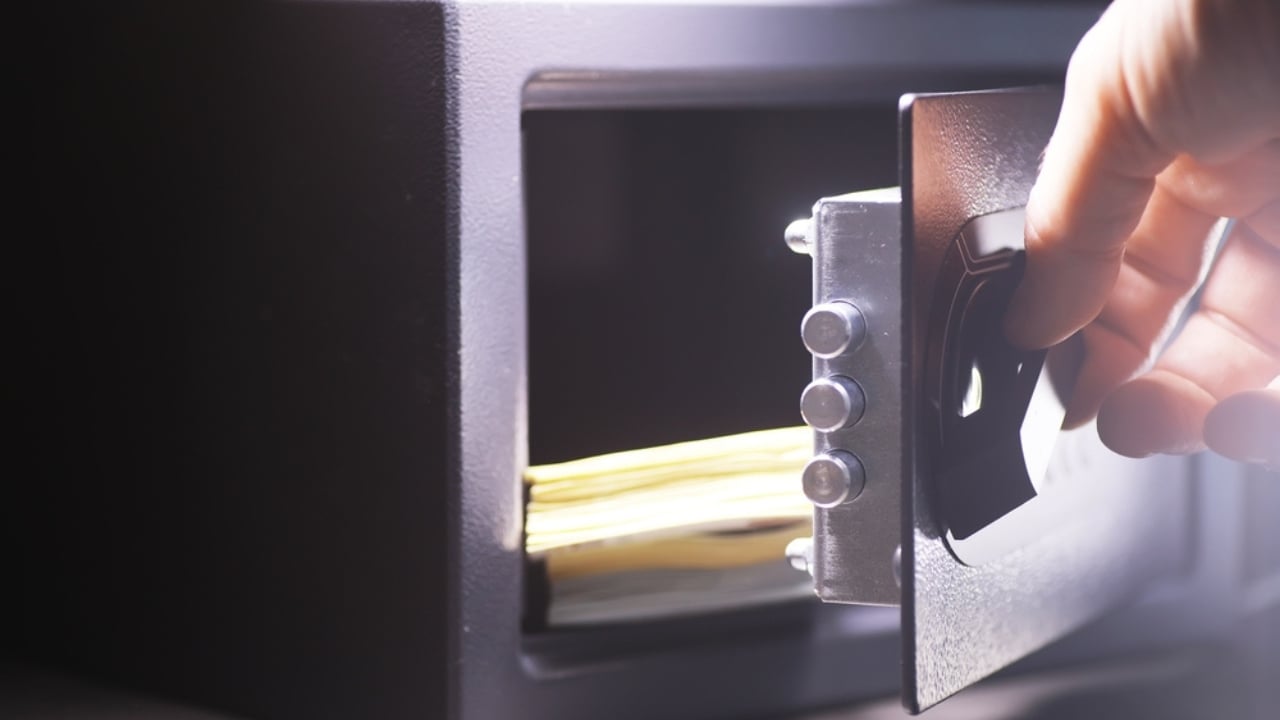 13 Items You Should Always Keep in a Safe for Maximum Security - opening safe ss2164369321 dnoh