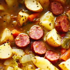 Simple Pork Stew with Sausage, Potatoes & Cabbage One-Pot Recipe - Pork Stew with Sausage Potatoes and Cabbage midia