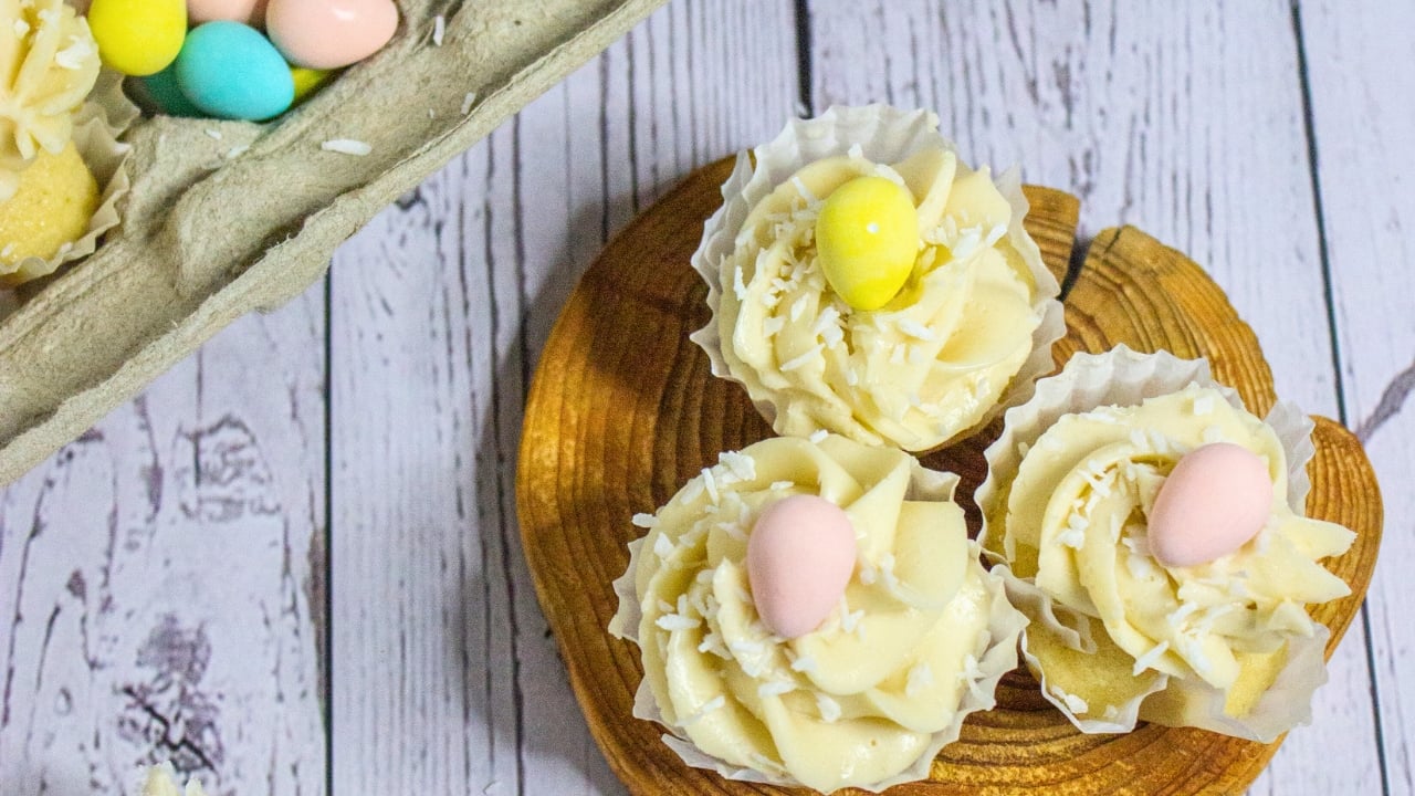 Lemon-Filled Easter Cupcakes With Creamy Frosting - vanilla frosted cupcakes 2