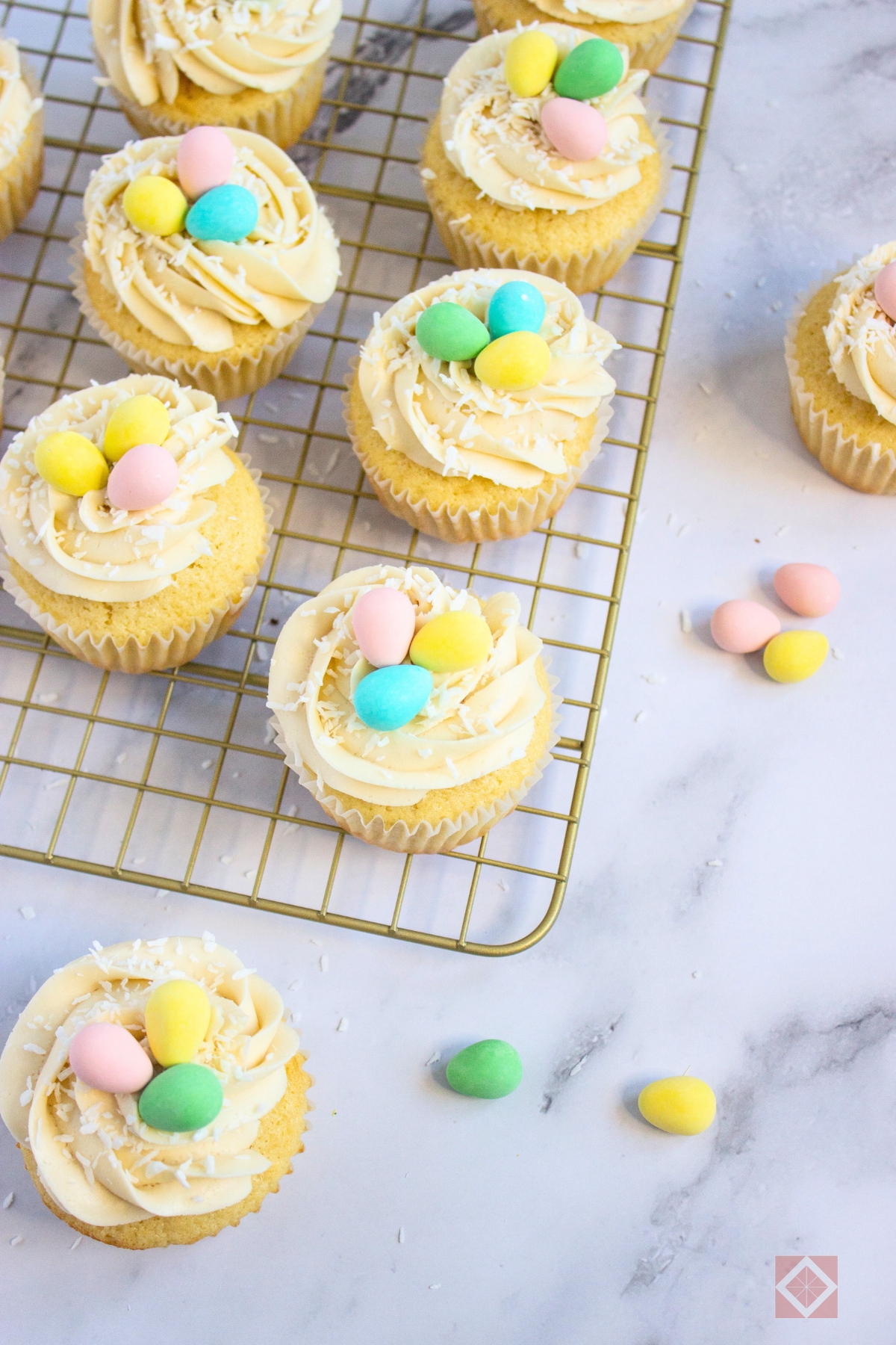 Lemon-Filled Easter Cupcakes With Creamy Frosting - vanilla frosted cupcakes 4