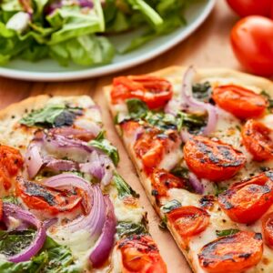 Crave-Worthy Pizza & Salad Combo: A Recipe for Two - Grilled Pizza Recipe with Charred Romaine Red Onion Salad midia