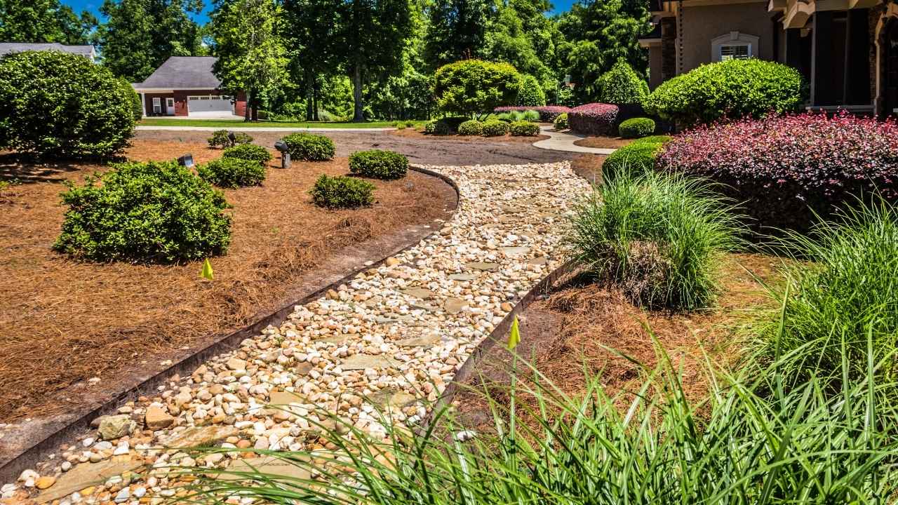 17 River Rock Landscaping Ideas That Turn Simple Yards Into Showpieces - river rock landscaping ideas ss1405129298 dnoh