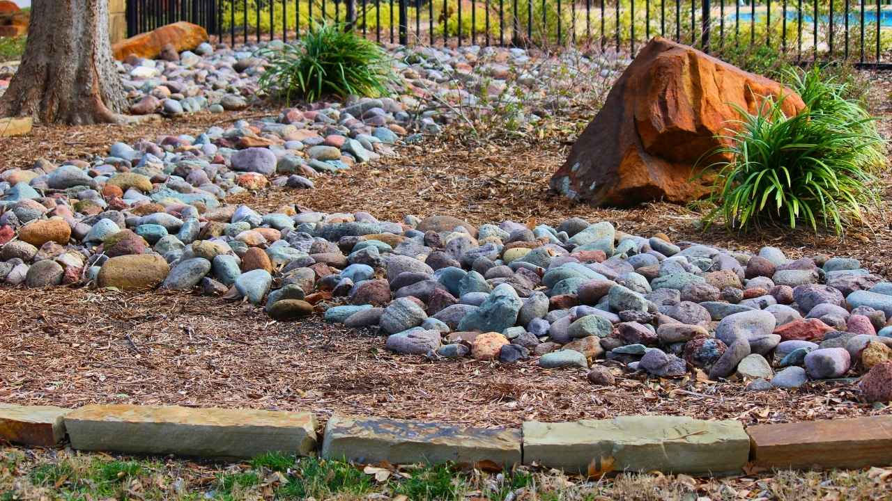 17 River Rock Landscaping Ideas That Turn Simple Yards Into Showpieces - river rock landscaping ideas ss1631927884 dnoh