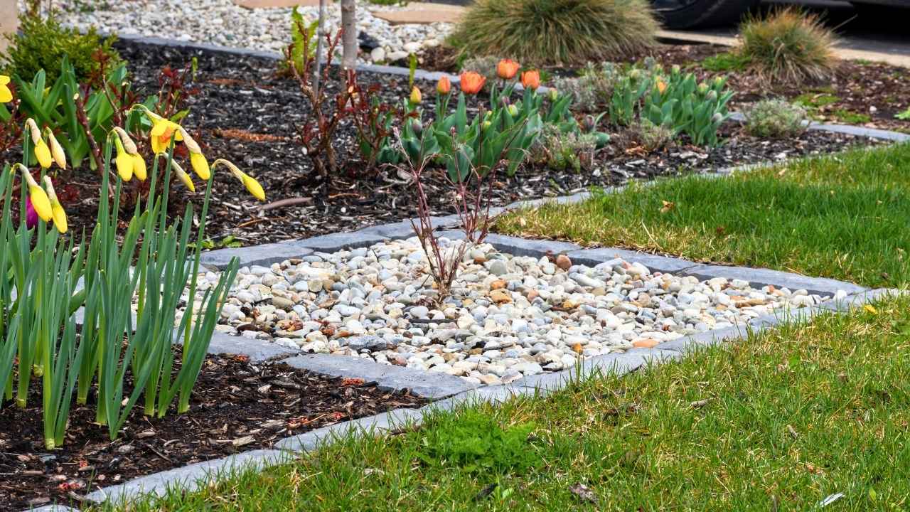17 River Rock Landscaping Ideas That Turn Simple Yards Into Showpieces - river rock landscaping ideas ss1960054312 dnoh